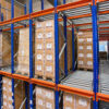 A gravity-fed system for FIFO pallet storage