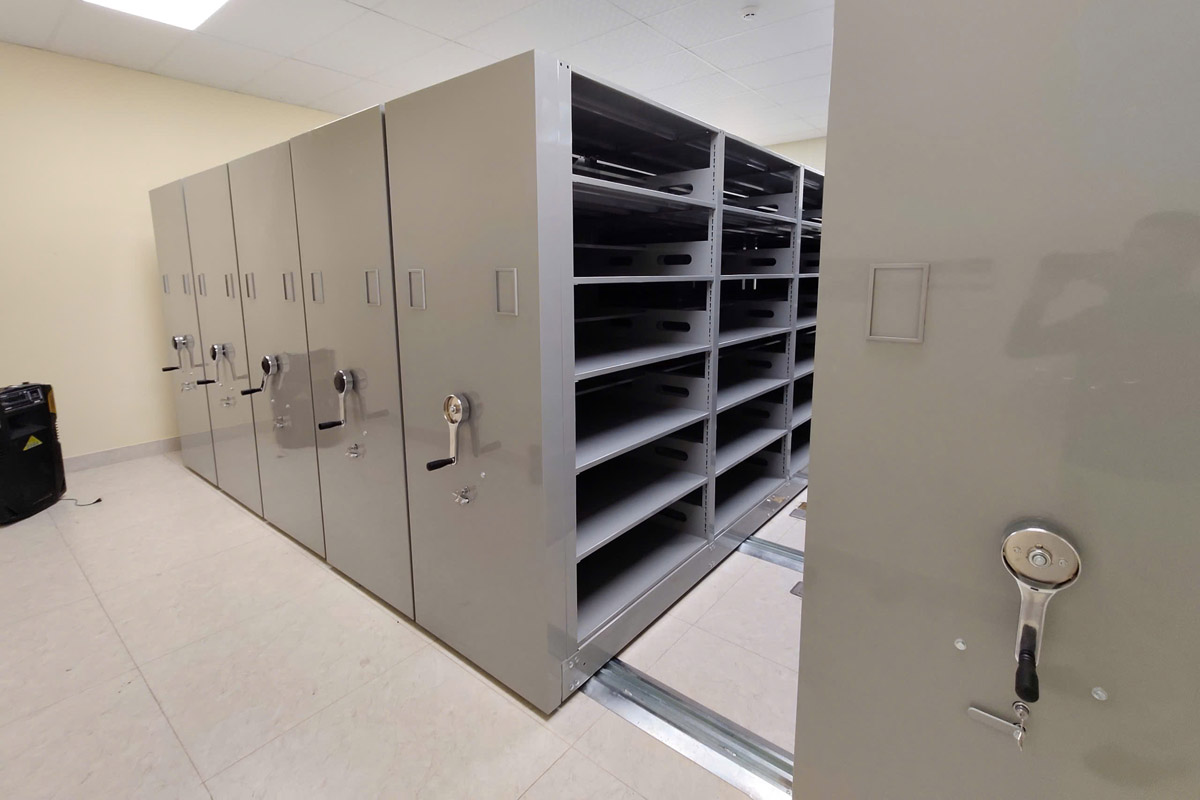 High-density storage that maximises floor space with automated aisle access for efficient retrieval.